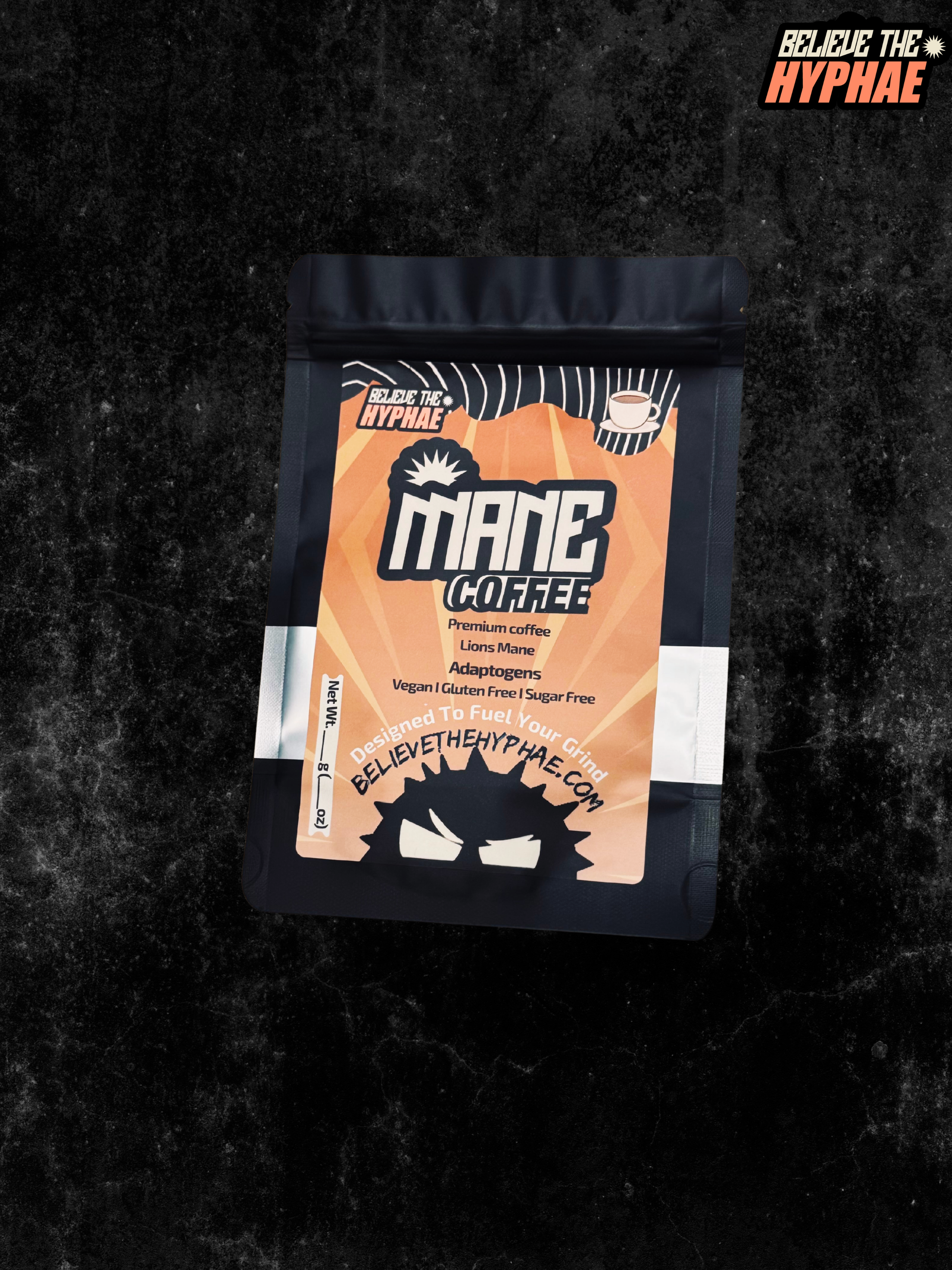 one pouch of Believe The Hyphae Mane Coffee, a premium lion's mane mushroom coffee blend made with adaptogens to support focus, clean energy, and cognitive performance. Vegan, gluten-free coffee displayed with roasted coffee beans
