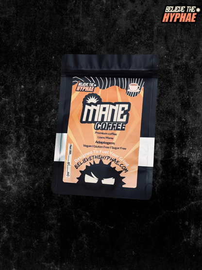 one pouch of Believe The Hyphae Mane Coffee, a premium lion's mane mushroom coffee blend made with adaptogens to support focus, clean energy, and cognitive performance. Vegan, gluten-free coffee displayed with roasted coffee beans